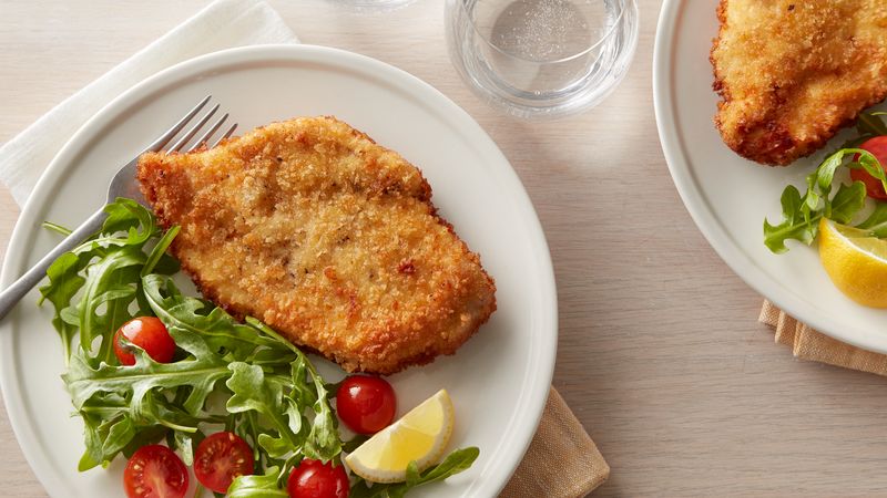 Chicken Schnitzel Arugula and Tomato Salad