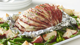 Sheet-Pan Cheesy Hasselback Ham, Potatoes and Asparagus